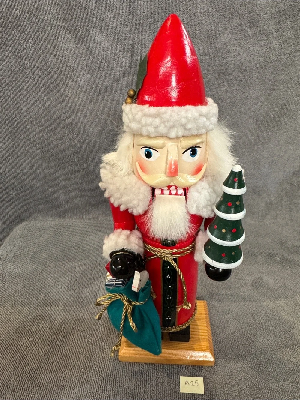 1990s 13.75 inch Santa Nutcracker with Green Tree and Sack of Toys Holiday Decor